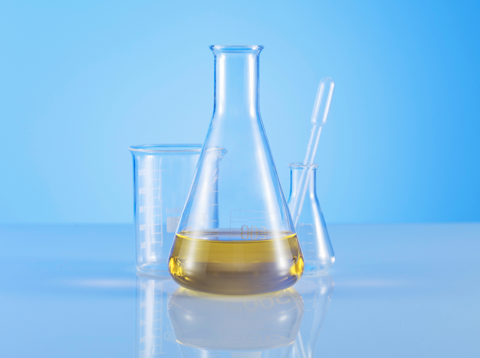Scientific Measuring Beakers With Colorful Liquid