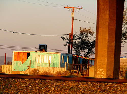 Stennet Rowe - Freeway Stanchion and Makeshift Dwellings, Central Valley California.