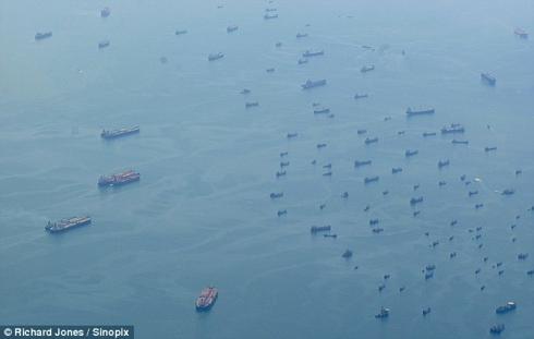 "ghost fleet of the recession" - hundreds of idle ships anchored off the straits of Singapore