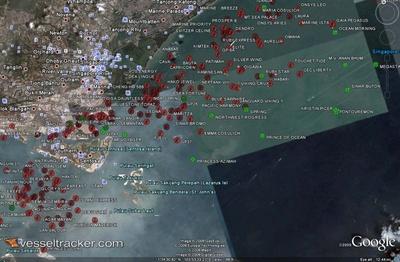Idle ships anchored off the Singapore Straits