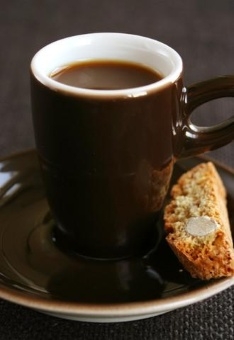 Cup of espresso and cookie