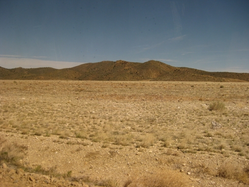 The tailings pit (engineering cap shown is approximately 3 feet thick)