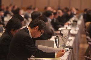 Delegates listen to Patrick Chovanec of Tsinghua University School of Economics and Management at the CFA Institute Asia Pacific Investment Conference