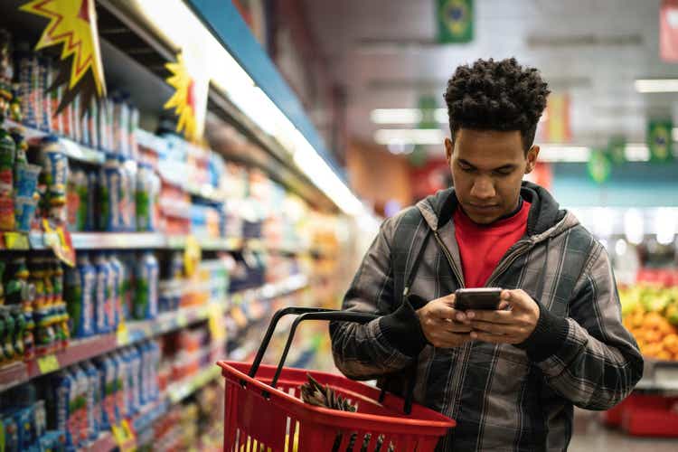Customer Buying with mobile app on Supermarket