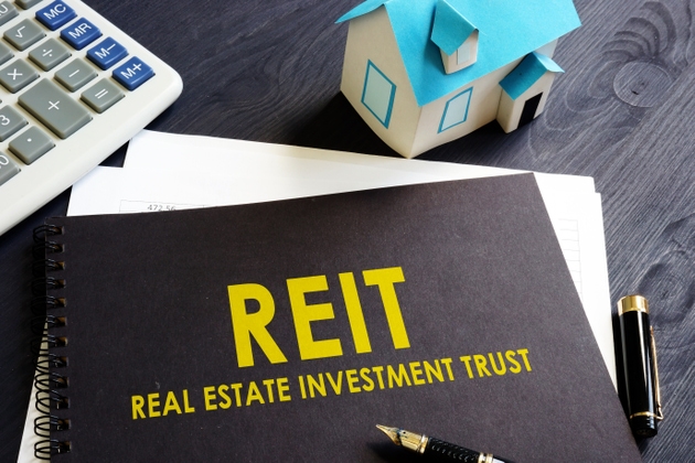 Real estate investment trust REIT on an office desk.