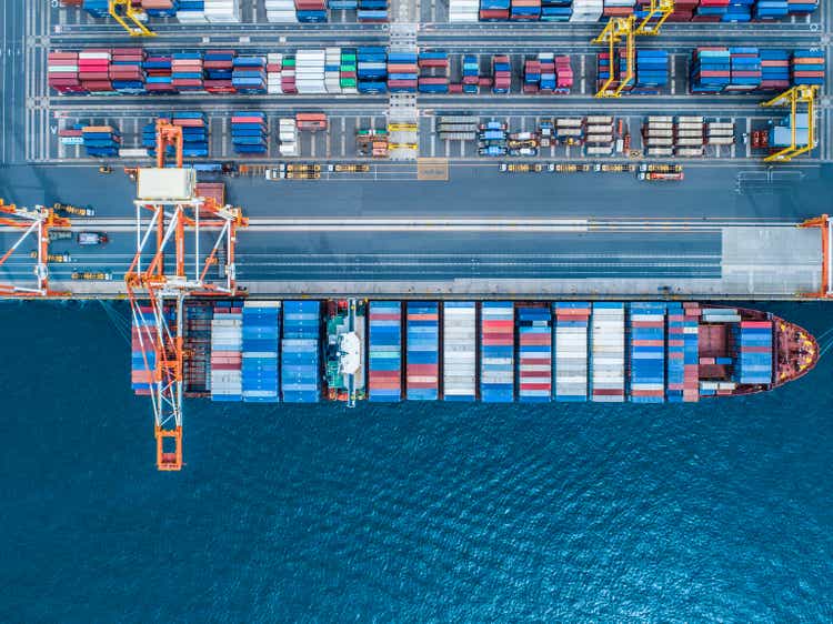 Aerial view of containers and container ship in sea