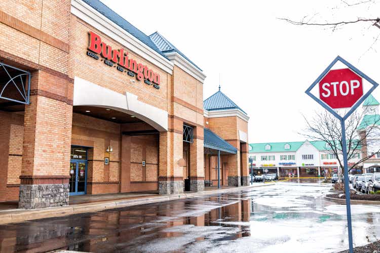 Burlington Coat Factory clothing store in Loudoun County, Virginia shop exterior entrance with red stop sign, plaza strip mall