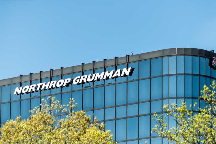 Exterior Northrop Grumman office business building in Georgia modern glass facade with sign in capital city