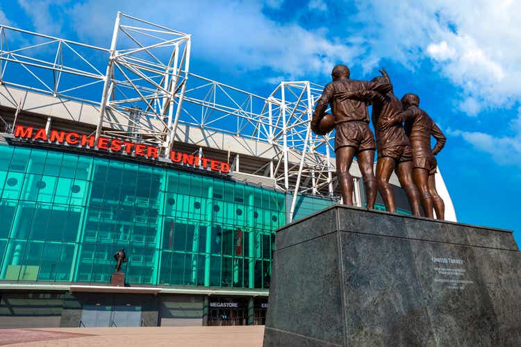 Bronze sculpture of the Trinity at Old Trafford Stadium in Manchester, UK