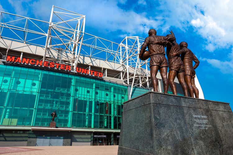 The United Trinity bronze sculpture at Old Trafford stadium in Manchester, UK