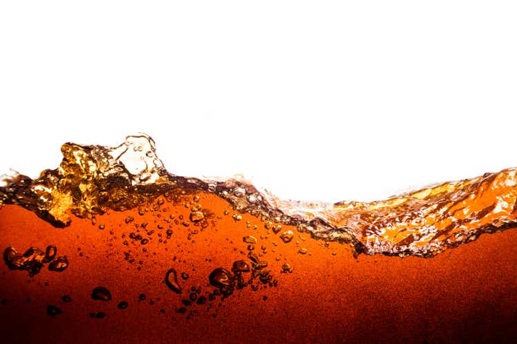 Background of refreshing cola flavored soda with bubbles