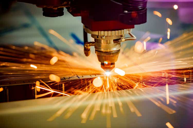 CNC Laser metal cutting, modern industrial technology.