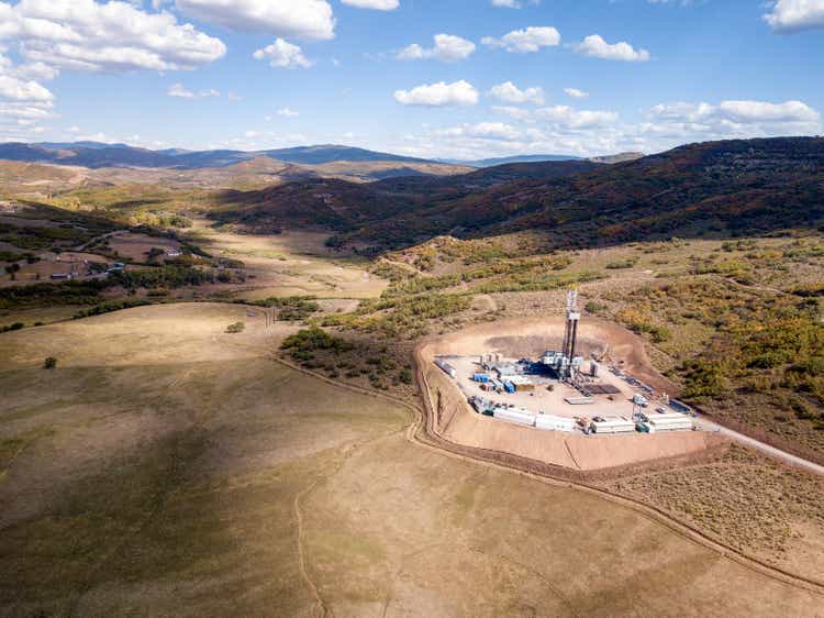 Aerial View of a Fracking Drilling Rig in the Autumn Mountains of Colorado