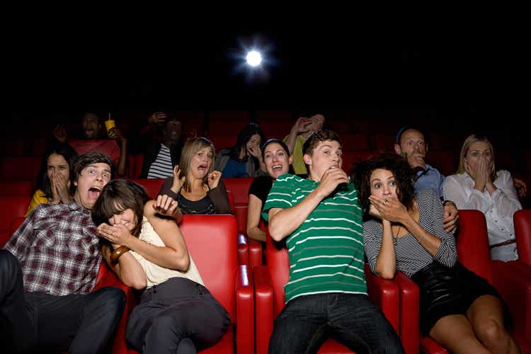 Shocked couples in the movie theater