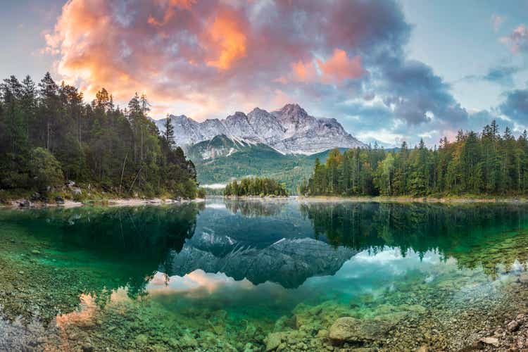 Mountain peak Zugspitze Summer day at lake Eibsee near Garmisch Partenkirchen. Bavaria, Germany