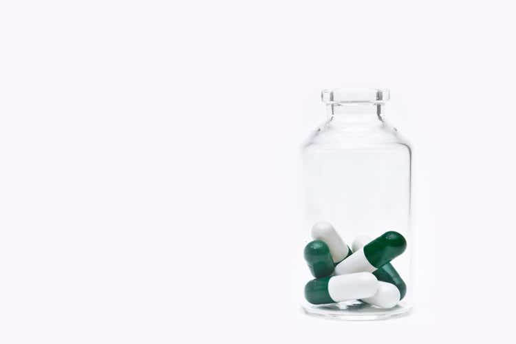 Biomedicine capsules in the transparent glass bottle