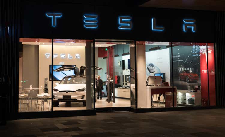 Tesla inc cars flagship store in Chengdu China with Tesla logo and an electric car model X inside