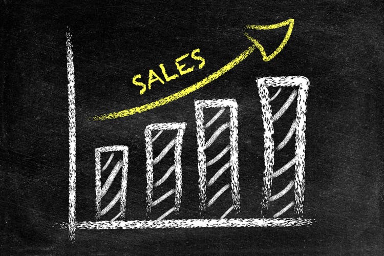 Ascending sales graph on blackboard
