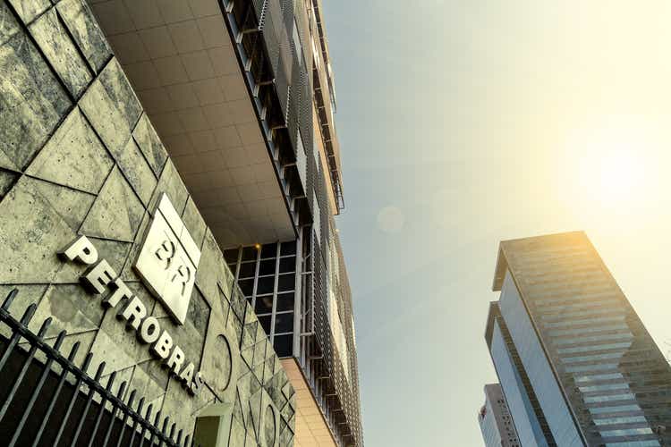 Petrobras oil company headquarters building during dusk seen from below along with other office buildings