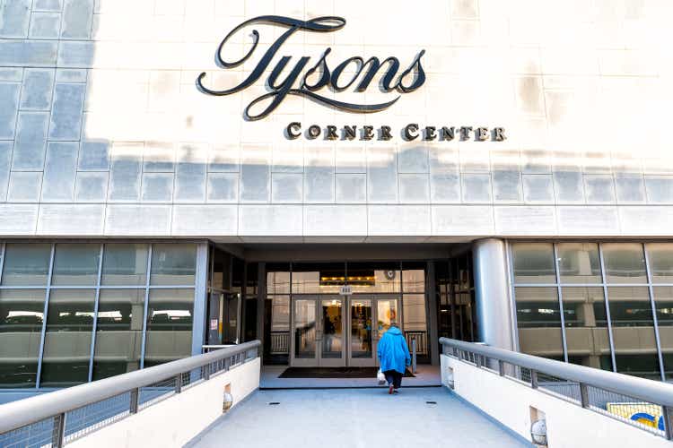 Facade Sign, entrance doors on bridge to Tyson"s Corner Mall in Fairfax, Virginia by Mclean with people walking