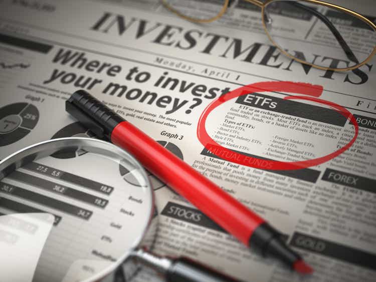 ETF is a best option to invest. Where to Invest concept, Investmets newspaper with ñoupe and marker.