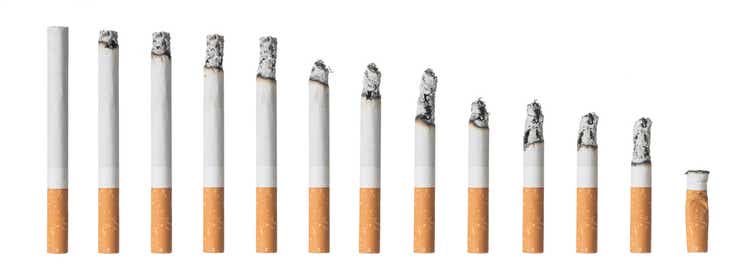 Set of different cigarettes isolated on white