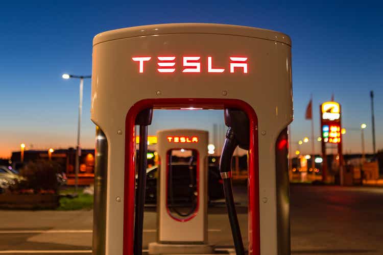 Modern Tesla supercharger at night near Stockholm. Sweden.