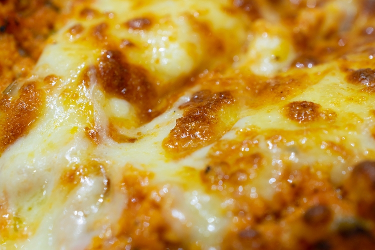 Close up on Pizza detail background.