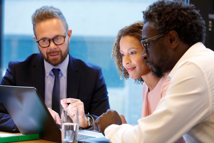 Financial advisor having a meeting with clients
