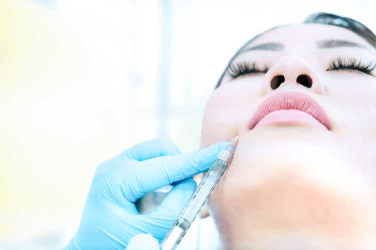 Face fillers / Botox injection in beauty saloon for skin treatment