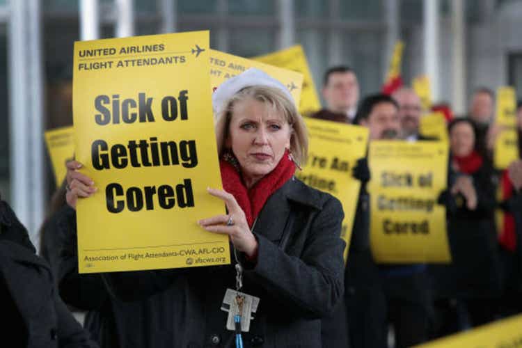 Flight Attendants At Chicago"s O"Hare Airport Picket Over Proposed Staff Cuts