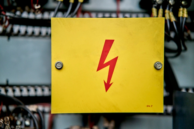 Old electricity sign board in a mechanical engineering industry