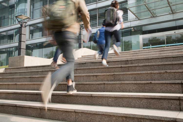 Chinese students running on campus