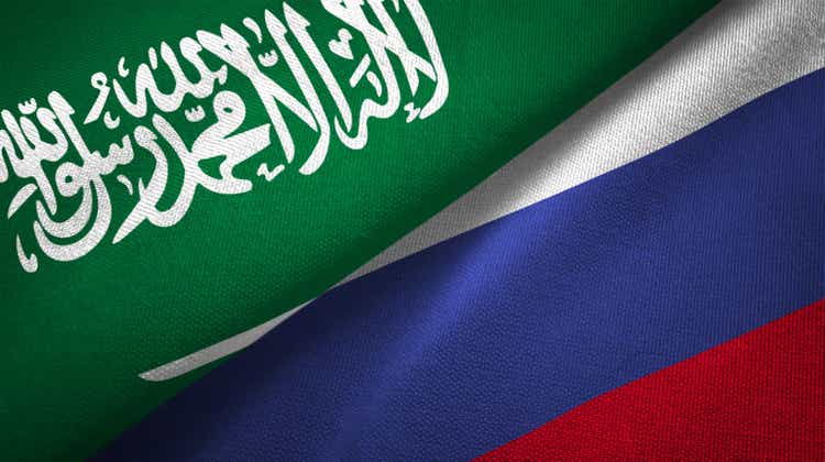 Russia and Saudi Arabia two flags together realations textile cloth fabric texture