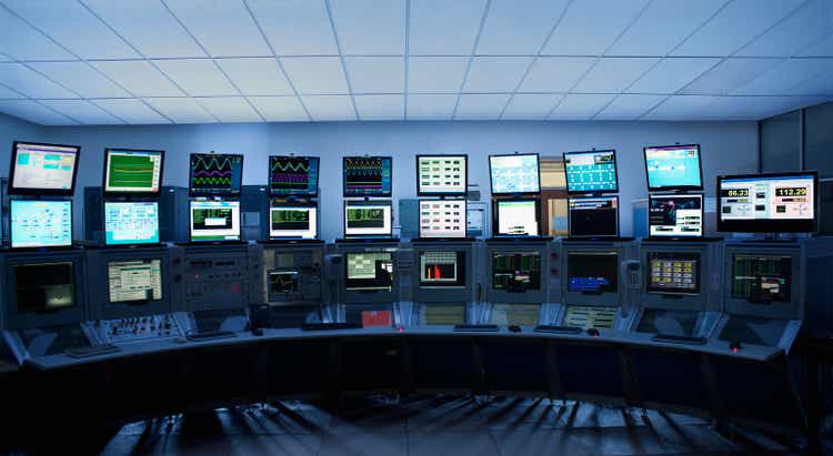 Computer screens in control room