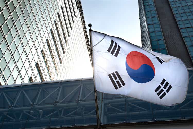 The Korean flag hanging in a high-rise building.