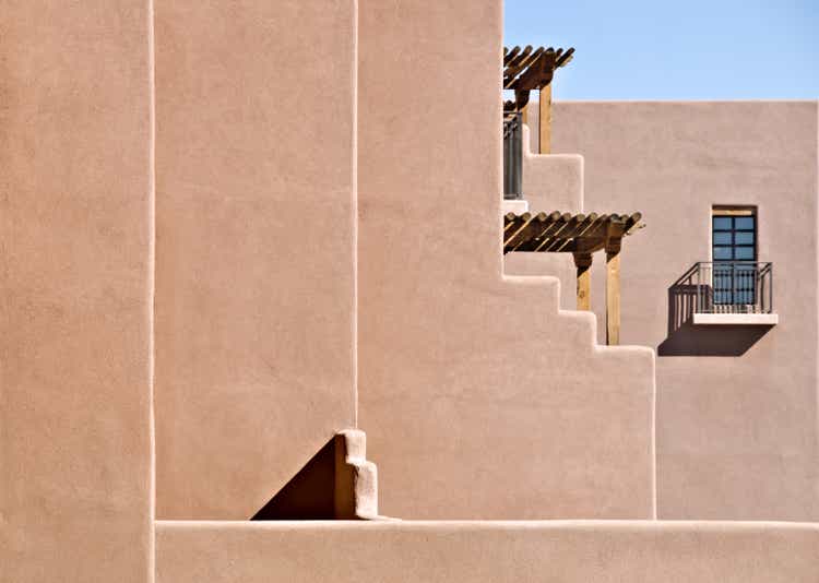 Southwest Santa Fe Adobe Stucco Building with Wooden Roof Beams