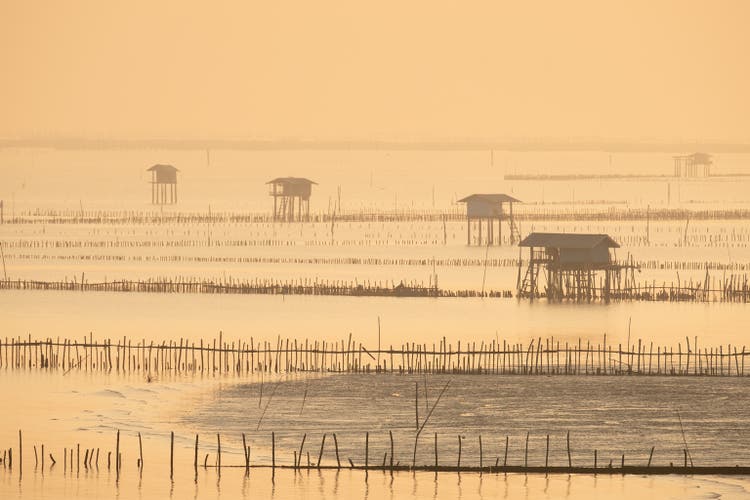 Fisherman"s hut in Bang Taboon Bay, South Of Thailand in the morning Light