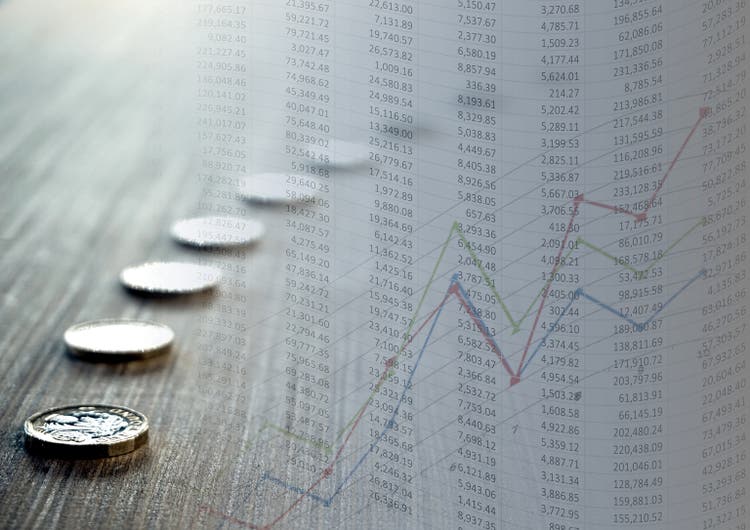 Spreadsheet with graph and coins