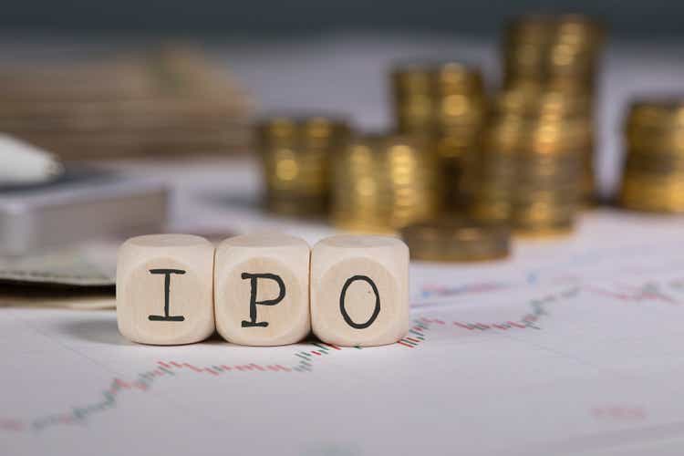 Abbreviation IPO composed of wooden letters.