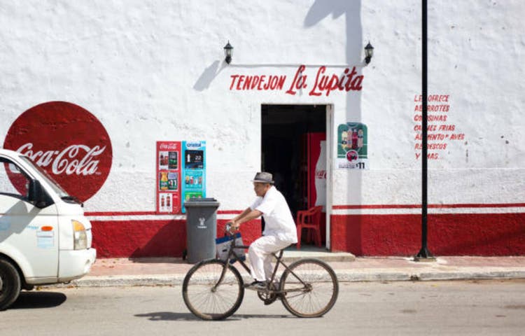  Bicyclist Passes Market