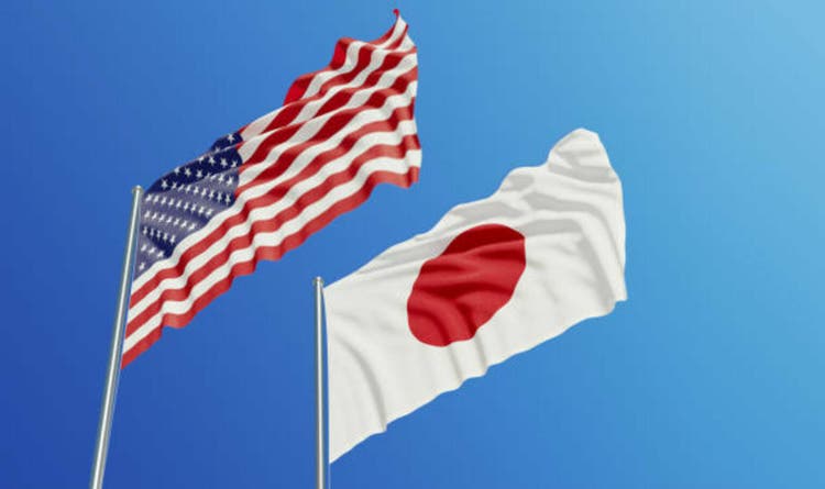 American and Japanese Flags Waving With Wind