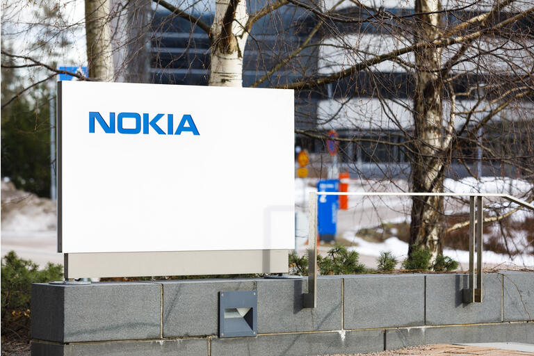 Blue Nokia logo on white board