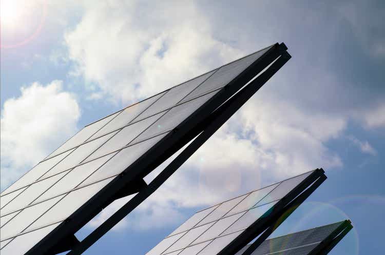 Solar tracker with the sun between the clouds