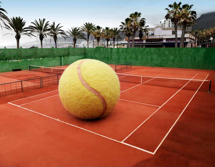 Oversized ball on an outdoor tennis court
