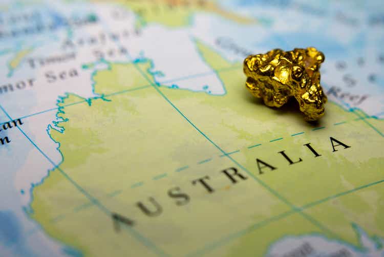Gold nugget on top of map of Australia