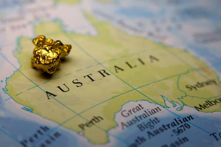 Gold nugget on top of map of Australia