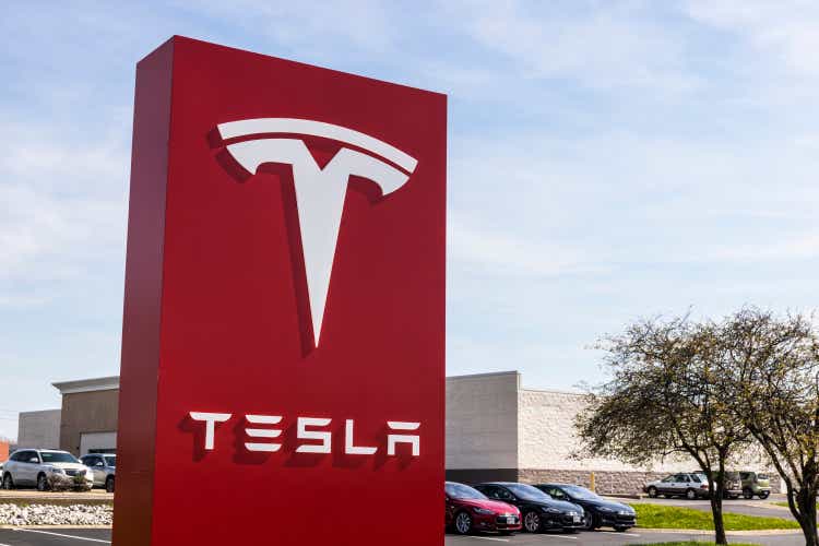 Tesla Service Center. Tesla designs and manufactures the Model S electrical sedan IV