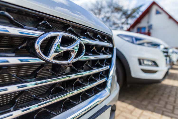 Hyundai logo on a Hyundai car at a car dealer