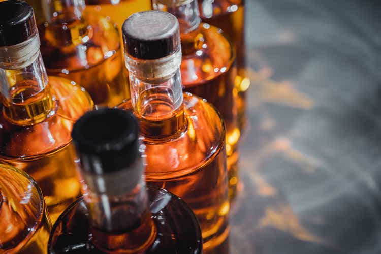 Bottles of strong liquors in production